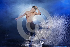 Man dancing in water.