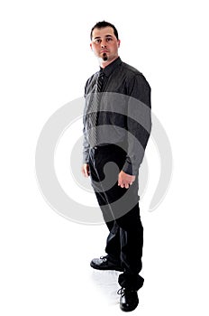 Man in dark grey shirt and tie