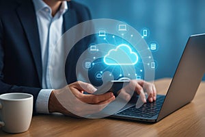 Man in suit using smartphone and laptop with glowing cloud technology network cloud computing data
