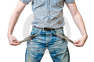 Man - debtor is showing empty pockets of his jeans ans symbol of no money photo