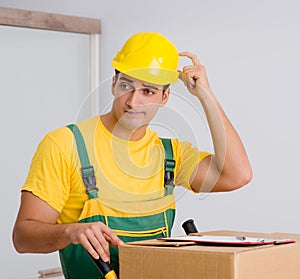 Man delivering boxes during house move