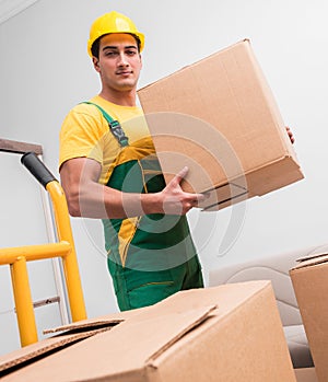 Man delivering boxes during house move