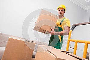 The man delivering boxes during house move