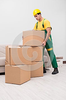 The man delivering boxes during house move