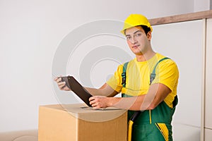 The man delivering boxes during house move