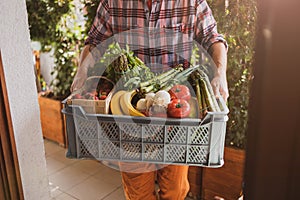 Man delivering fruit and vegetable photo
