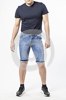 a man in denim shorts