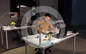 Man or designer with computer and tablet at office