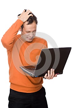 Man despairing with computer
