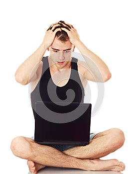 Man despairing with computer.
