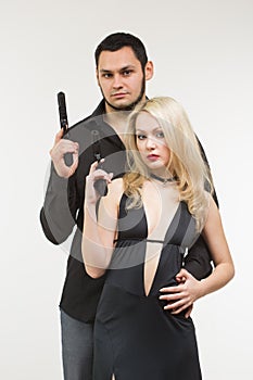 Man detective agent criminal and spy woman with gun.