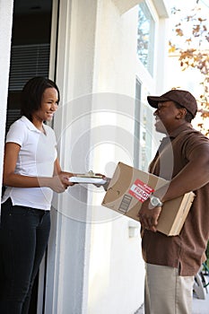 Man Devlivering Package