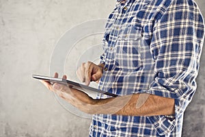 Man with digital tablet computer