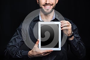Man with digital tablet photo