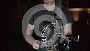Man or director using a film camera