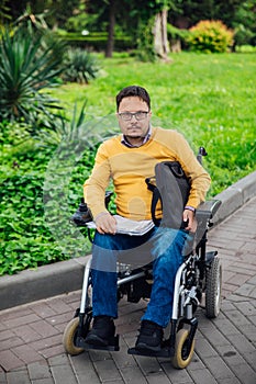 man with disabilities in wheelchair job business job