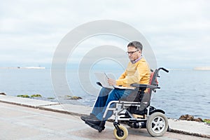 man with disabilities in wheelchair job business job