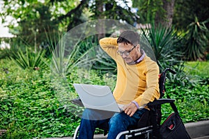 man with disabilities in wheelchair job business job