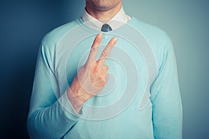 Man displaying rude gesture