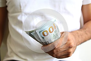 Man Displaying a Spread of Cash