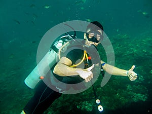 Man diving alone in a coral