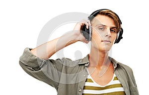 Man, DJ and portrait with headphones for music, audio streaming, event or party against a studio background. Young male