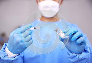 Man, doctor and hands with syringe for vaccine, injection or flu shot in surgery at hospital. Closeup of male person