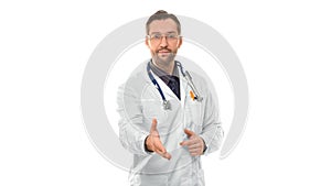 Man doctor holds out his hand to say hello. Greeting patient. Healthcare medicine concept isolated on white background.