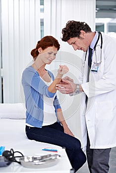 Man, doctor and patient or wrist consultation with healthcare insurance or pain, results or diagnosis. Male person
