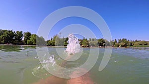 Man does backstroke while open water swimming