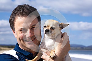 Man with dog on beach