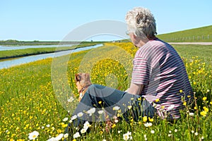 Man and dog on Dutch wadden island Texel photo