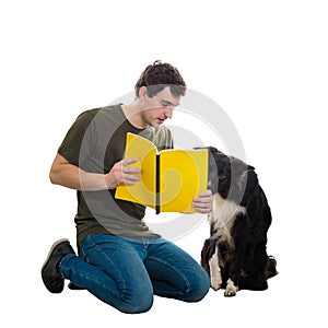 Man and dog reading book