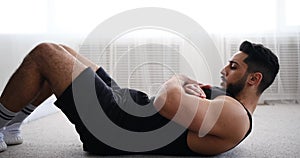 Man doing abdominal endurance training exercise
