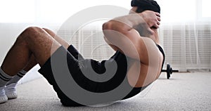 Man doing abdominal endurance training exercise