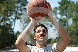 Man doing basketball shot