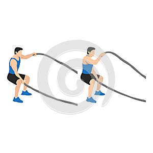 Man doing battle rope squatting alternating waves