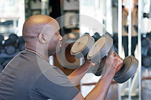 Man doing bench press with a dumbbells