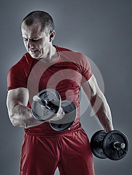 Man doing biceps curl with dumbbells