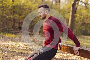 Man doing bodyweight dips