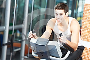 Man doing cardio training on machine