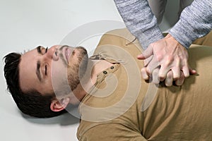 Man doing a cardiopulmonary resuscitation