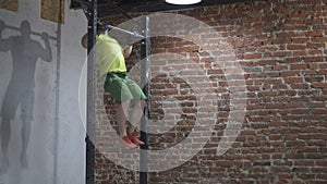 Man doing chest to bar pull-up