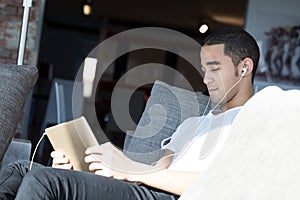 Man doing a conference call relaxed at home