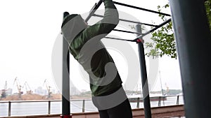 Man doing exercise in park. Fitness man doing pushups outdoor. Fit boy workout in summer park. Fitness and sport