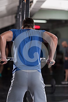 Man doing exercises parallel bars