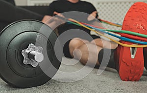 Man doing exercises with resistance bands.