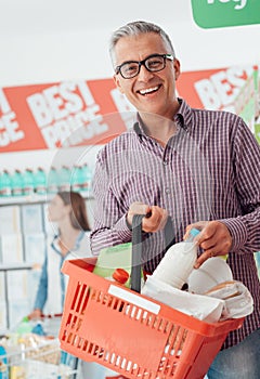 Man doing grocery shopping photo