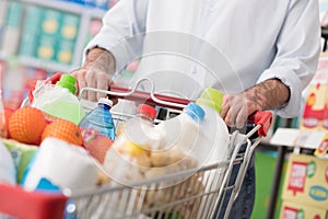 Man doing grocery shopping photo