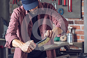 Man doing metalwork in a workshop